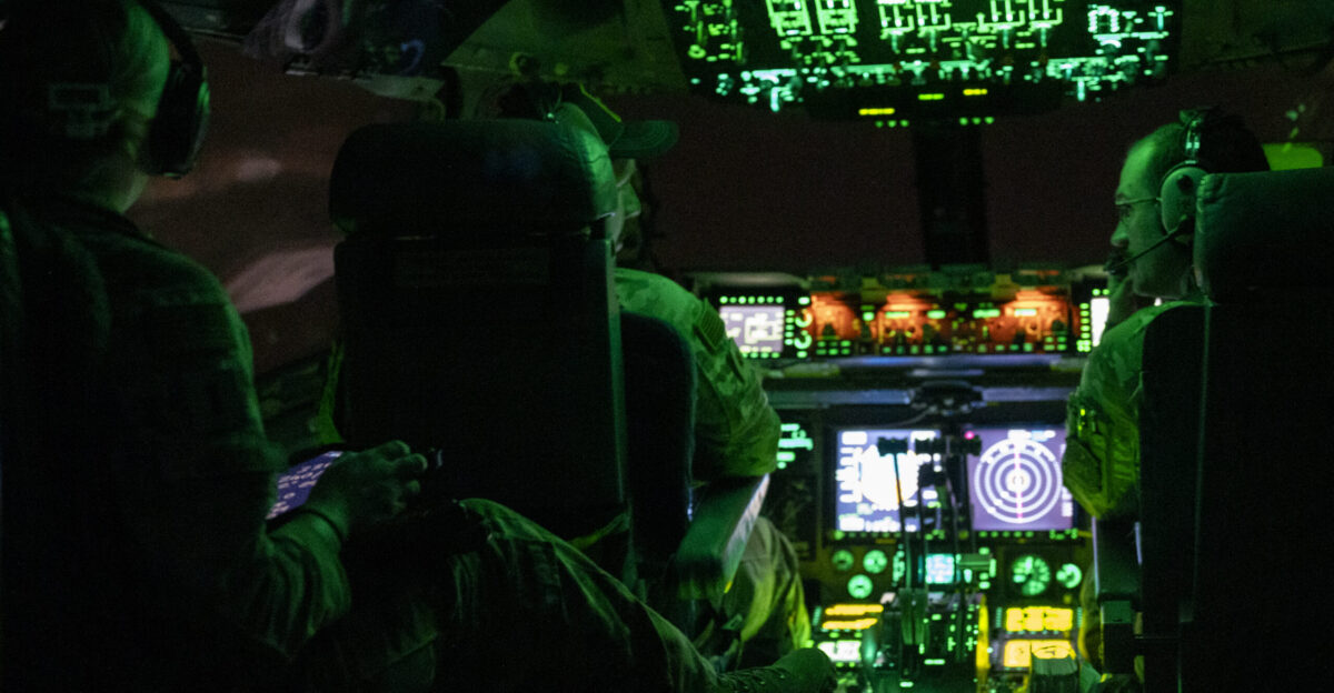 Three U S Air Force C-17 Globemaster III pilots assigned to the 167th Expeditionary Airlift Squadron Shepherd Field Air National Guard Base West Virginia communicate during flight over the U S Central Command USCENTCOM area of responsibility AOR Sept 5 2024 Deployed C-17 aircrew conduct missions throughout the USCENTCOM AOR to provide aerial transport capabilities to U S personnel and assets U S Air Force photo