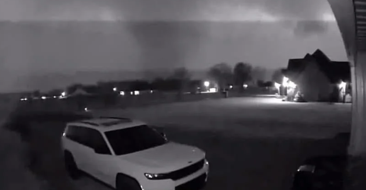 A violent (EF4+) tornado that hit Diaz, AR, seen from a driveway security camera.