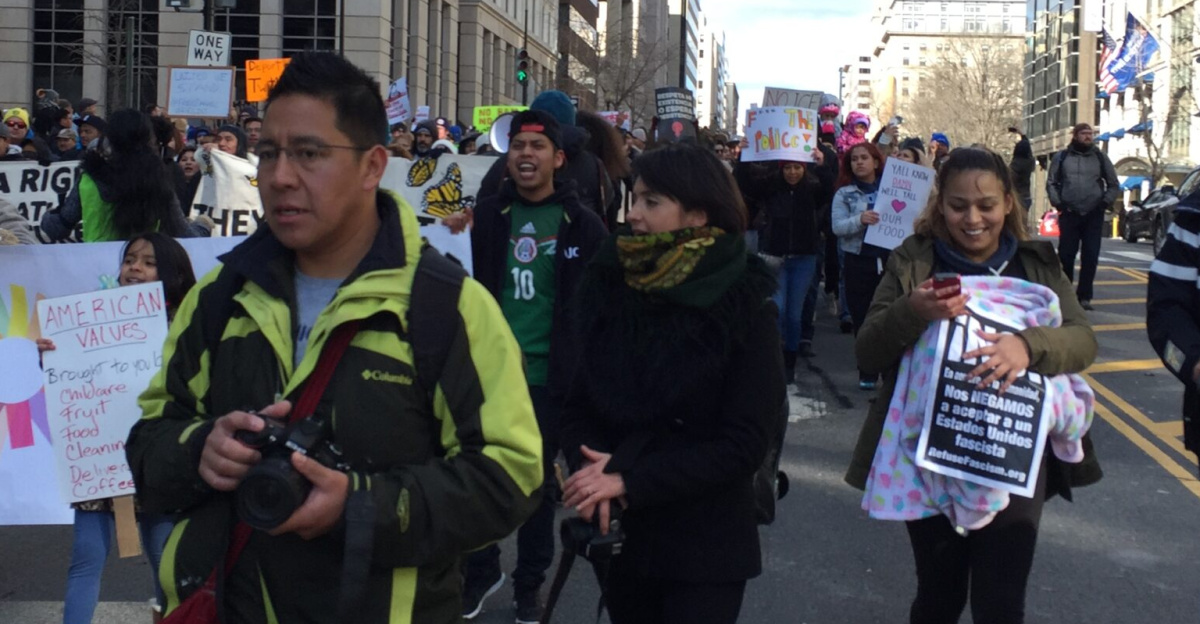 A largely Latino crowd walked from Washington's historically Latin American neighborhood of Mount Pleasant south to the headquarters of the city's government.
