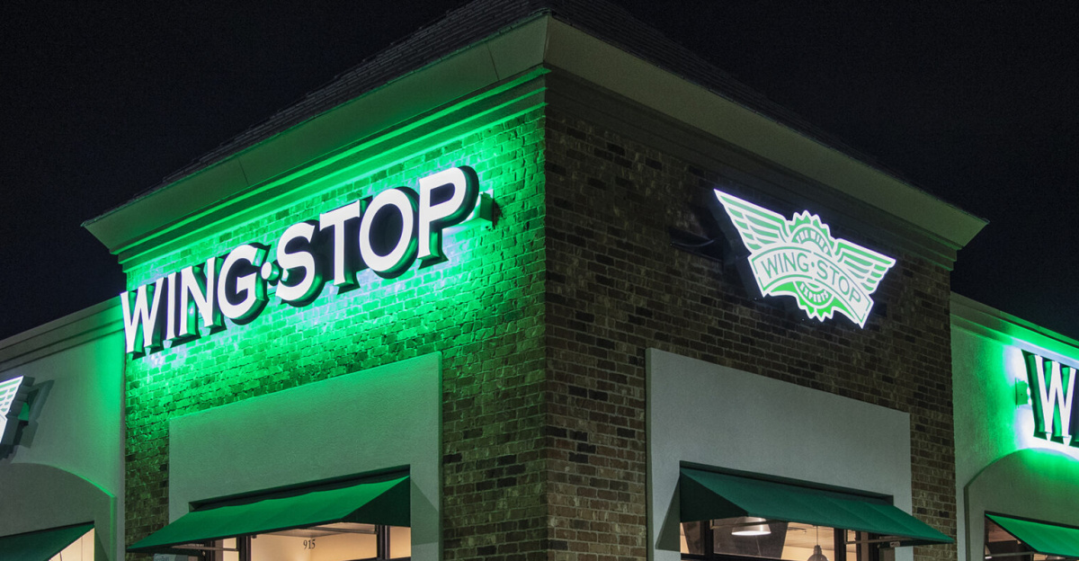Exterior night shot of Wingstop restaurant in Irving, Texas