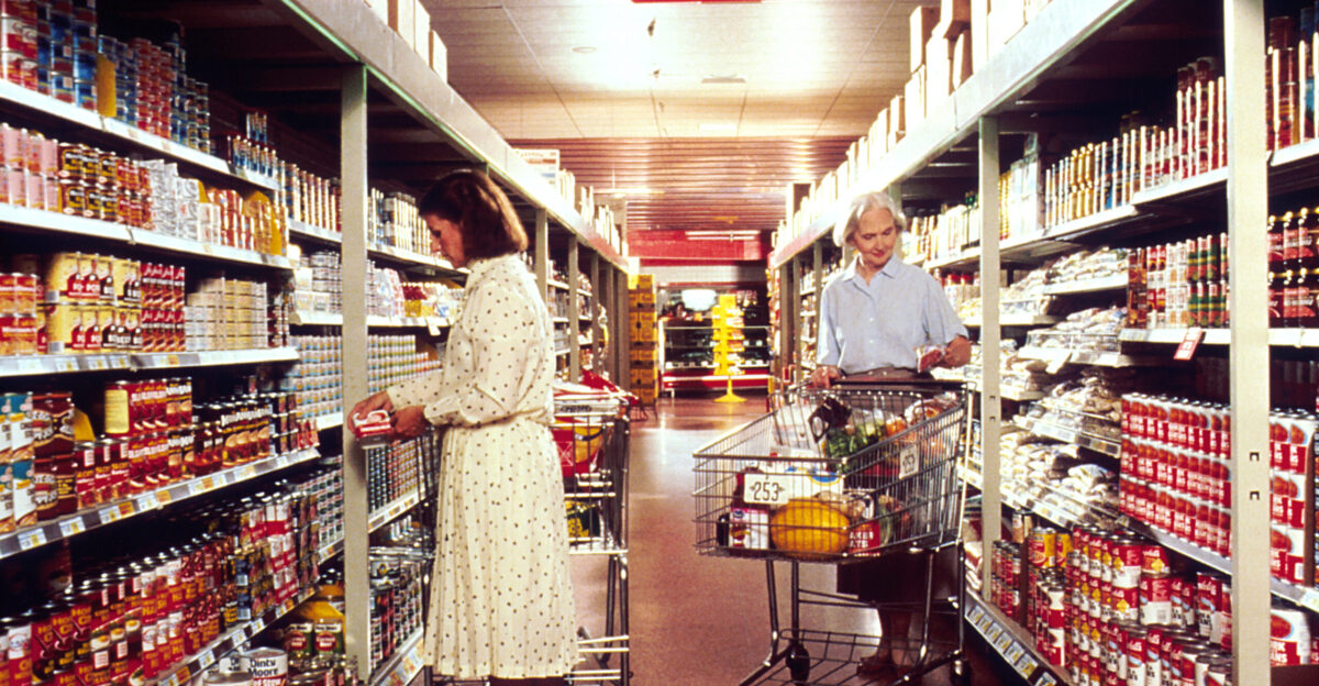Title Women Grocery Shopping Description Two Caucasian women standing with grocery carts selecting items in a grocery store aisle Topics Categories Food and Drink People - Adult Type Color Photo Source National Cancer Institute