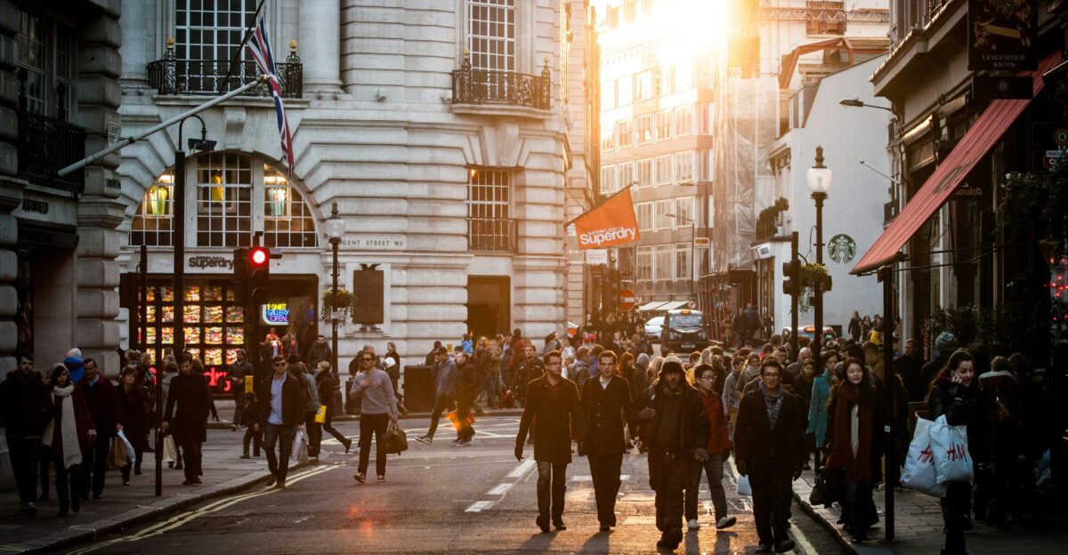 group of people standing at city