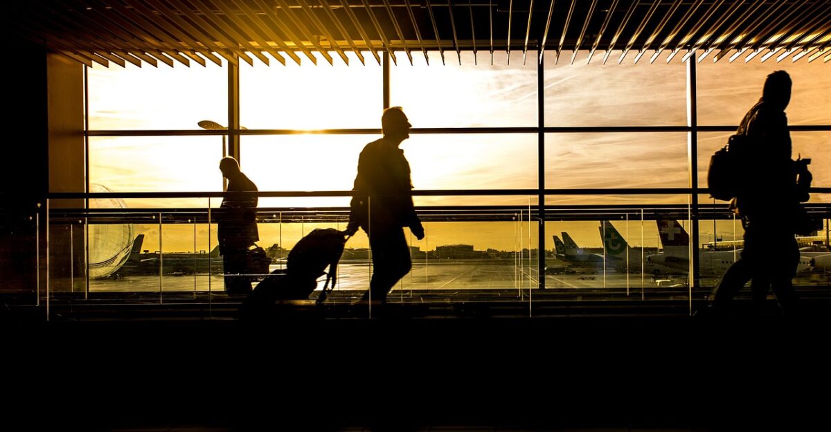 airport terminal man travel travelers passengers silhouettes backlighting people flight transport businessmen walking sunlight transportation trip journey planes airport airport airport airport airport